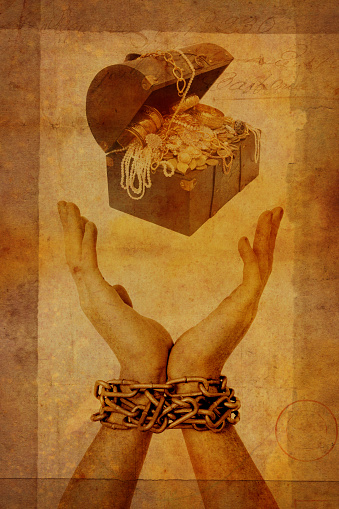 Treasure Chest above outstretched chained hands with grunge effect.  Note that this is a composite, and all images used in this piece of art are my own.