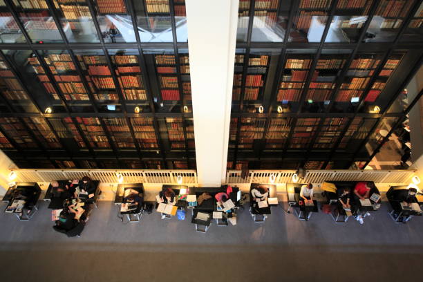 Readers in The British Library stock photo