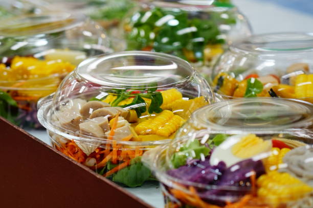 Ready To Eat Healthy Salads for sale in market Salad of fresh vegetables and healthy fruit in clear plastic box  for sale in market food state stock pictures, royalty-free photos & images