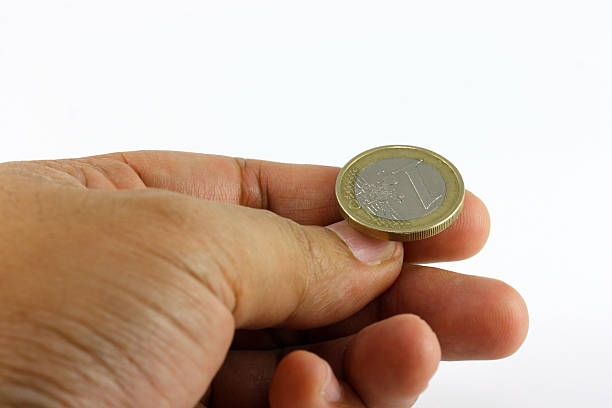 Ready to flip euro coin stock photo
