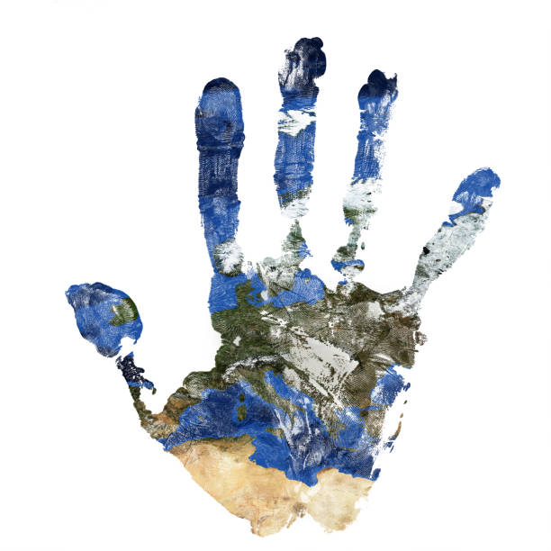 Real hand print combined with a map of Europe of our blue planet Earth. Elements of this image furnished by NASA stock photo