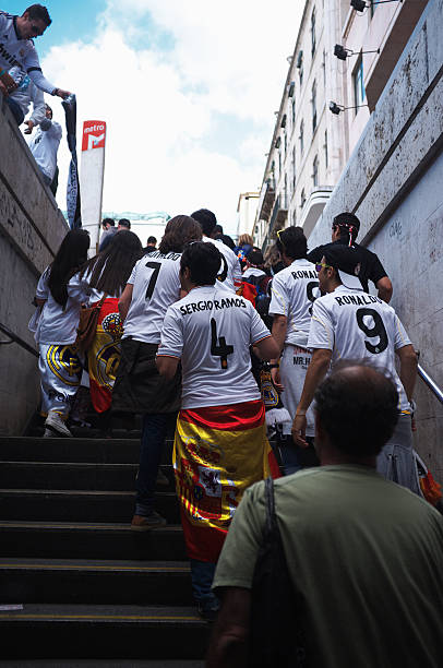 Real Madrid Fans in Lisbon Lisbon, Portugal - May 24, 2014: Real Madrid fans exit a subway station in Lisbon during the Champions League final day. real madrid stock pictures, royalty-free photos & images