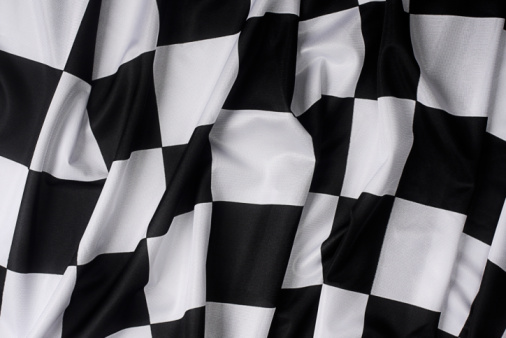 Real Waving Checkered Flag Stock Photo - Download Image Now - iStock Repeating Checkered Flag Background