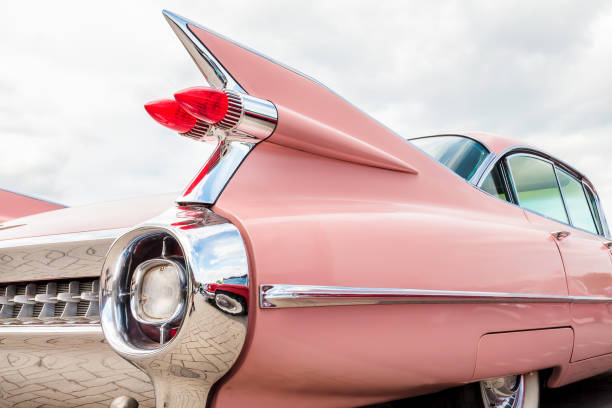 Rear end of a pink classic Cadillac car stock photo
