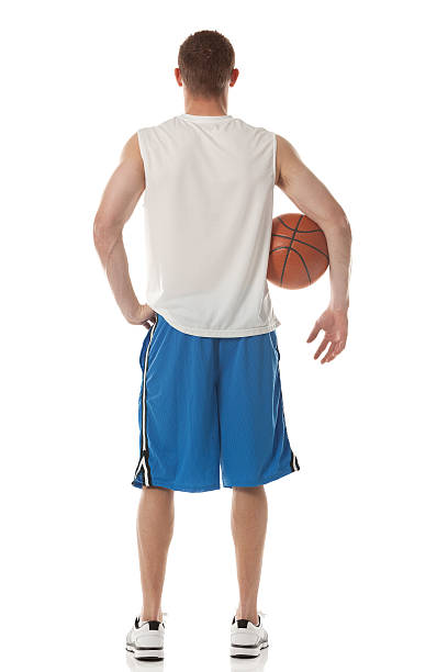 rear view of a basketball player - basketball player back stockfoto's en -beelden