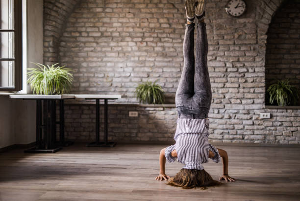 Headstand Stock Photos, Pictures & Royalty-Free Images ...