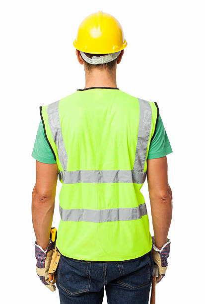 Rear View Of Construction Worker Wearing Reflective Clothing stock photo
