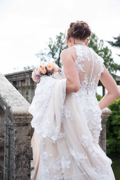 Rear View of Elegant Bride Outdoors stock photo