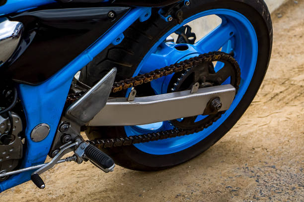 Rear wheel of motorcycle. Chain transmission. Beautiful blue moto. stock photo
