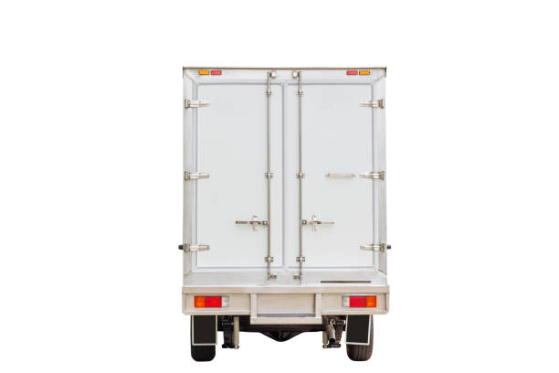 Rearview white delivery van with clipping path on white background, Cargo van delivery truck vehicle template mockup stock photo