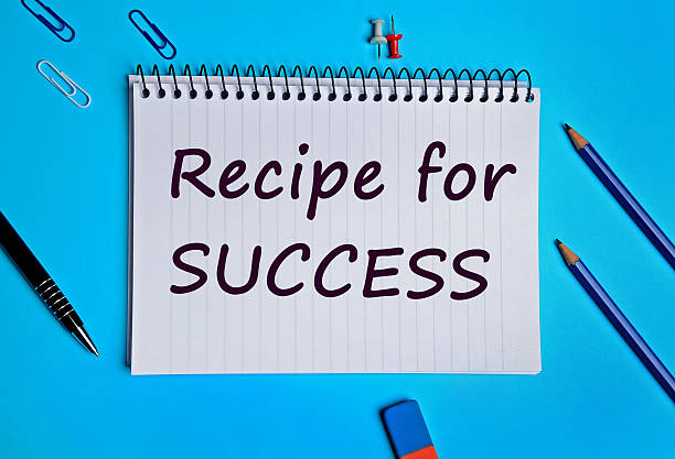 Recipe for success words on notebook stock photo