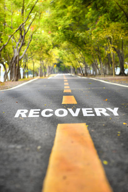 Recovery written on road stock photo
