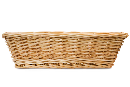 Wicker Basket shot from the front, isolated on white.