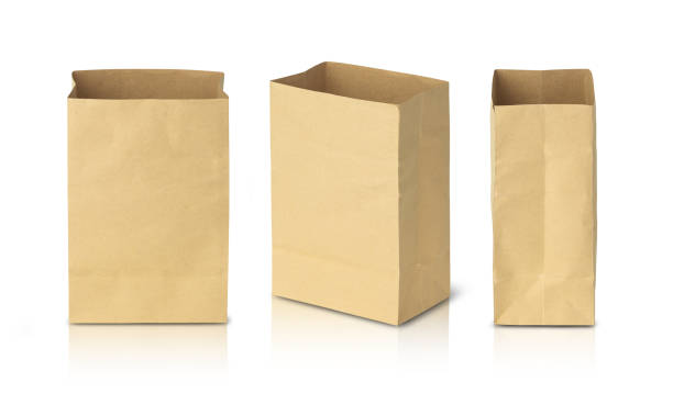 recycled brown paper bags isolated on white background with clipping path - paper bag craft imagens e fotografias de stock