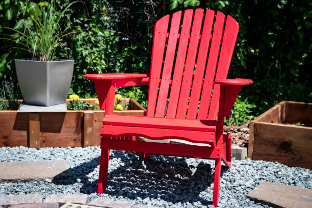 Red Adirondack chair stock photo