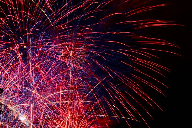 красный и синий фейерверки - happy new year стоковые фото и изображения