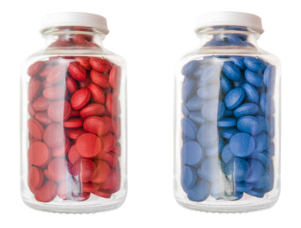 röda och blå piller koncept - två burkar piller bildbanksfoton och bilder