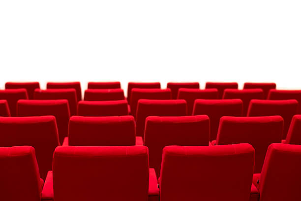 Red and empty theater seats isolated stock photo