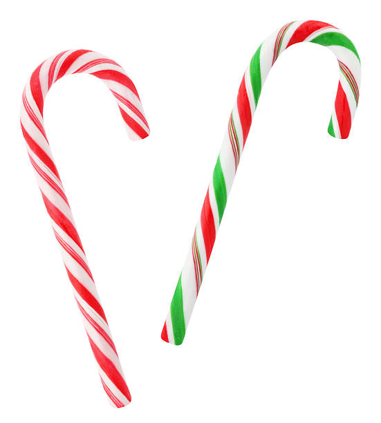 Red and green candy canes Christmas red and green candy canes isolated on white candy canes stock pictures, royalty-free photos & images