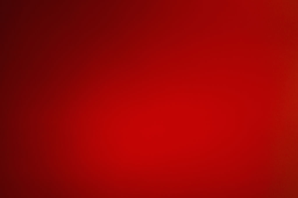 Dark red blurred background with gradient. blank for text and design