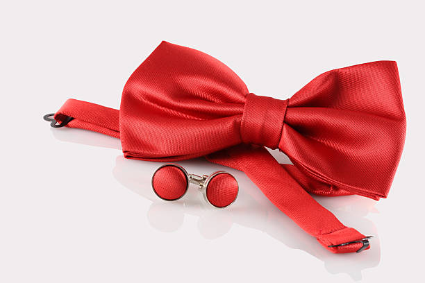 red bow tie  with cuff links stock photo