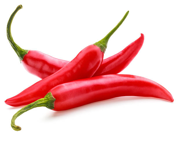 red chili or chilli cayenne pepper isolated on white  background red chili or chilli cayenne pepper isolated on white  background cutout cayenne pepper stock pictures, royalty-free photos & images