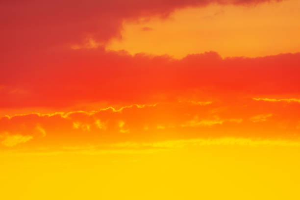 Red clouds at yellow sky stock photo