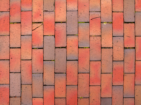 full frame red cobblestone background seen in Northern Germany