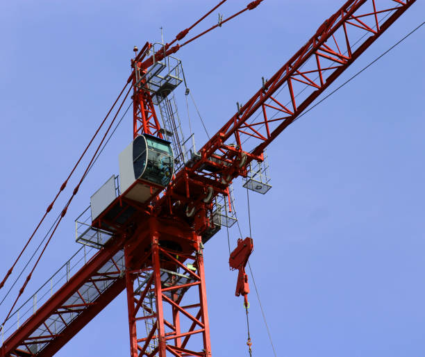 red construction crane stock photo