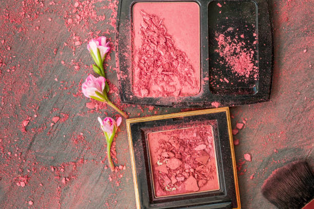 Red cosmetic powder stock photo