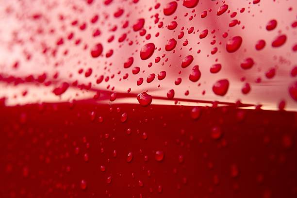 Red drops of water  lacquered stock pictures, royalty-free photos & images