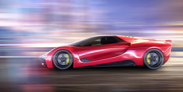 A generic red electric supercar moving fast along a road with lots of motion blur on the road and background to make an abstract light pattern. The high performance sports car reflects lights from the surroundings making streaks on its body.