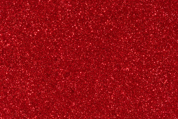 red glitter texture abstract background - vermelho imagens e fotografias de stock