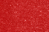 istock Red glitter texture background 1296945171