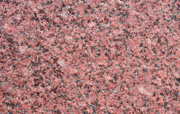 Red granite background Red granite wall with quarts as background granitic stock pictures, royalty-free photos & images