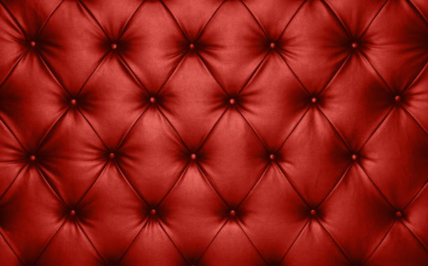 Red leather capitone background texture stock photo