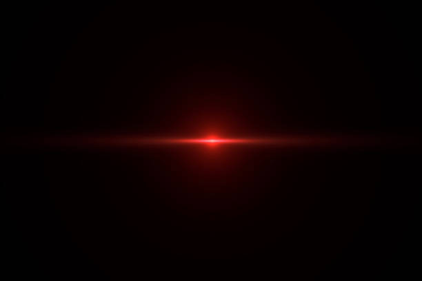 bagliore delle lenti rosse su sfondo nero - alta risoluzione - red spotlight foto e immagini stock