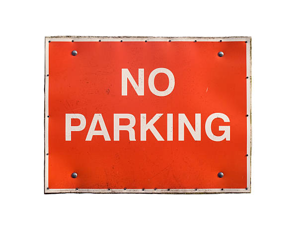 Red No Parking sign isolated on white stock photo