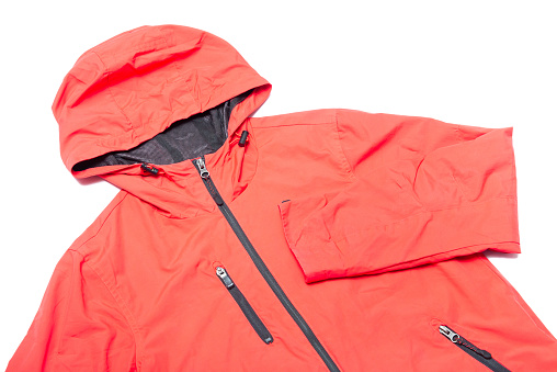 Red orange and black zipper windbreaker hiking jacket, rain proof jacket hoodie, track jacket sport nylon full zip isolated on white
