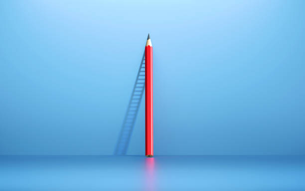 Red pencil leaning on blue wall casts the shadows of a ladder. Horizontal composition with copy space. Importance of Education and Ladder of Success concept.