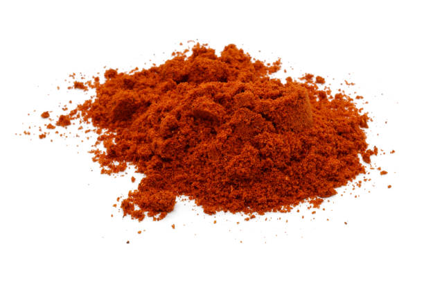 Red pepper powder isolated on white Red pepper powder isolated on white background cayenne pepper photos stock pictures, royalty-free photos & images