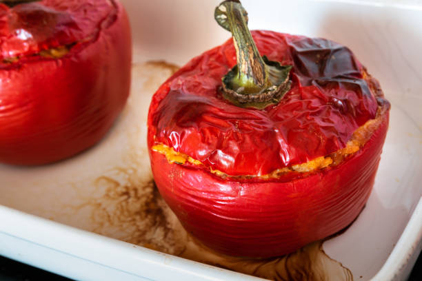 Red pepper stuffed with baked rice stock photo