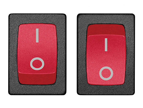 Red power switch in on off position, isolated macro closeup stock photo