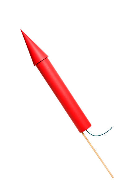 Red rocket all set for take off Red Bottle Rocket with fuse ready for launch firework explosive material stock pictures, royalty-free photos & images