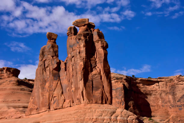 Red Rocks and blue sky at Arches National Park, Utah Red Rock formations in arches National Park, Utah entrada sandstone stock pictures, royalty-free photos & images