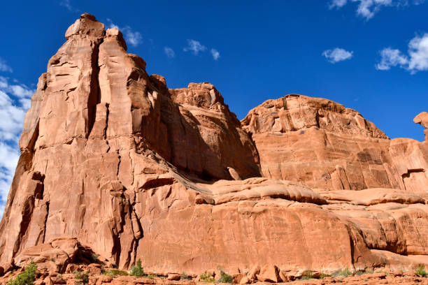 Red Rocks Arches National Park Red rock formation in Arches National Park, Utah against a blue sky. entrada sandstone stock pictures, royalty-free photos & images