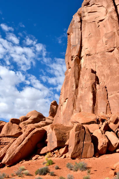 Red rocks at Arches National Park Red rock formation against a blue sky at Arches National Park, Utah. entrada sandstone stock pictures, royalty-free photos & images