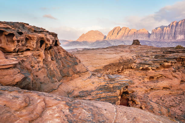 Red sandstone rocks formations in Wadi Rum also known as Valley of the Moon desert, Jordan, scene reminiscent to Mars planet stock photo