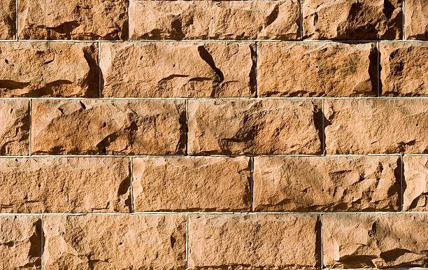 Red Sandstone Wall Textured Background stock photo