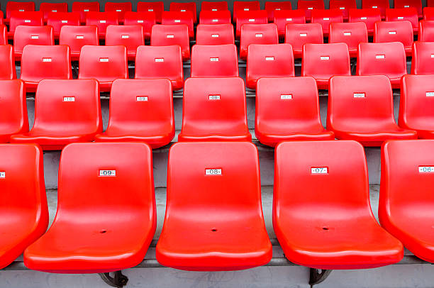 roten platz im stadion - stadium soccer seats stock-fotos und bilder